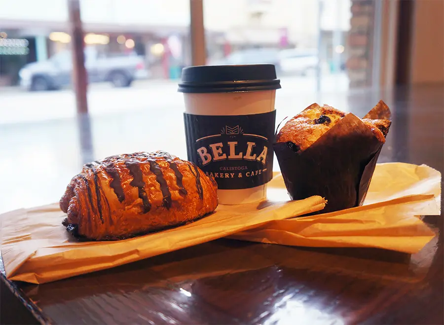 Wake Up with Chocolate Croissant, Blueberry Muffin, and Latte at Bella Bakery